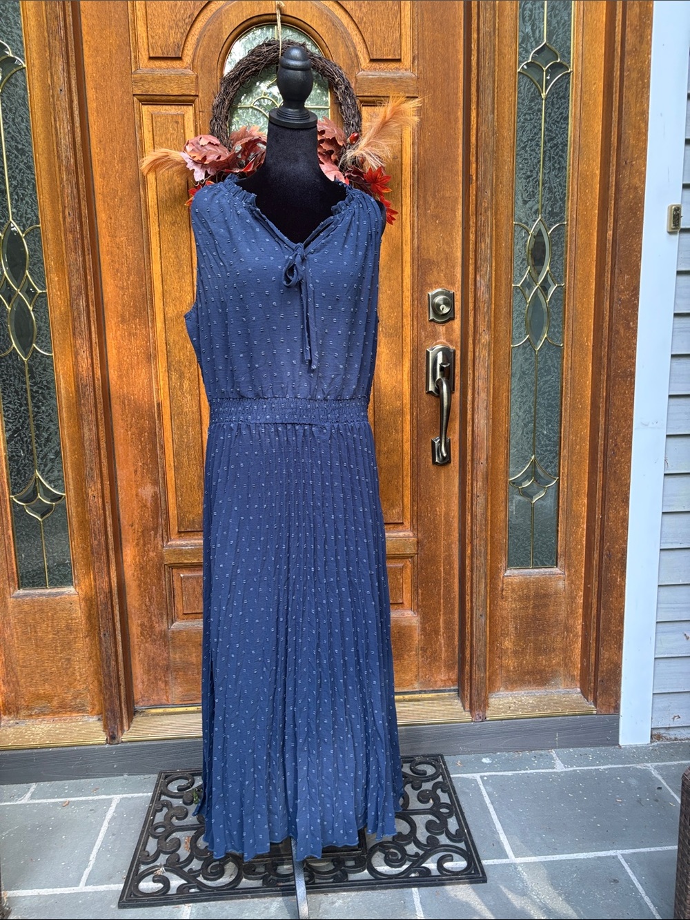 Sleeveless Navy Maxi Dress with Tie Neck and Pleated Skirt